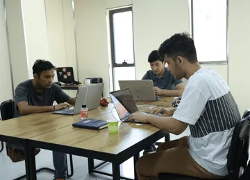 The Bito team at work in the open-plan Tashkent office